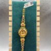 Antique gold ladies watch with pink green pearls